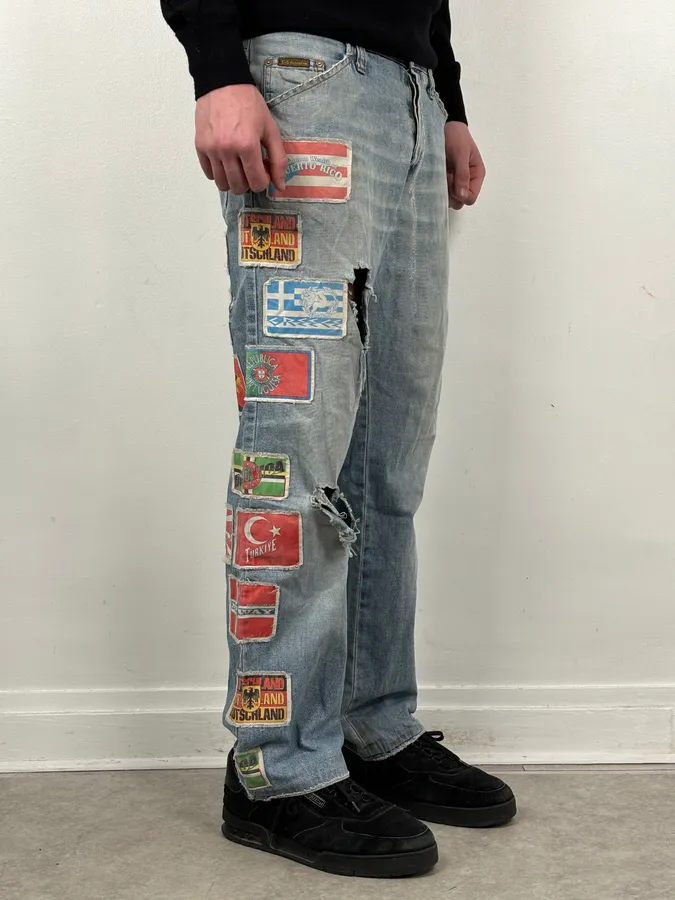 AW2004 Dolce & Gabbana Light Blue Distressed Patch Flag Denim Jeans - Image 3
